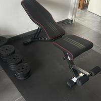 Panca con pesi regolabili e tappeto