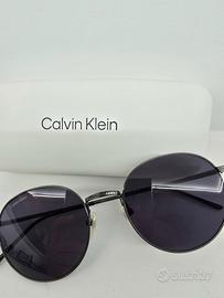 Occhiali sole Calvin Klein CK22110TS 014 TITANIO