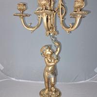 Coppia candelabri in bronzo dorato.