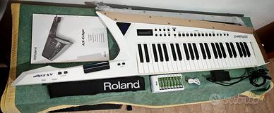 Roland AX Edge White,alimentatore/tracolla/8 pile