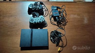 PS2 Slim + 8 giochi