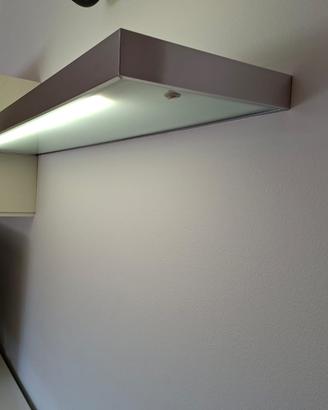 Mensola con luce in vetro e acciaio 