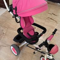 Triciclo con copertura fuxia