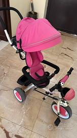 Triciclo con copertura fuxia