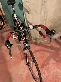 bici da corsa Dinatek