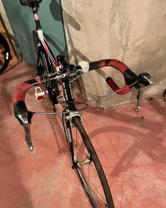 bici da corsa Dinatek