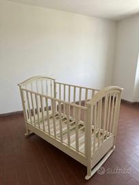 Culla a dondolo in legno con materasso