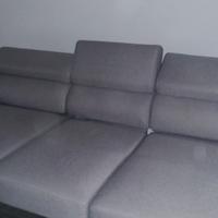 Divano con penisola e sedute scorrevoli