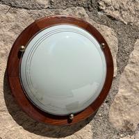 Lampada a muro con base di legno
