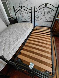 Struttura letto con reti di doghe