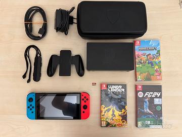 nintendo switch + giochi + custodia + SD 32gb