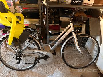 Biciclette con seggiolini