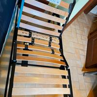 Rete in ferro motorizzata con doghe in legno