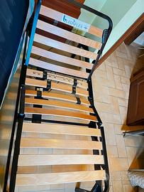 Rete in ferro motorizzata con doghe in legno