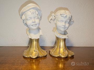 Coppia busti porcellana Biscuit Benacchio Triade