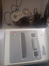 SNES con cavi e un controller