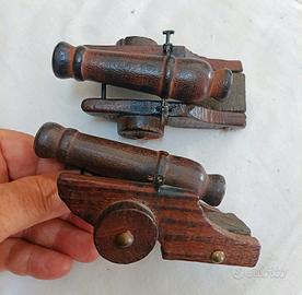 Coppia di cannoni in legno vintage 