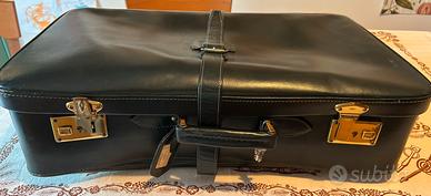 Valingia in pelle anni 50/60. Misure 63x40x18