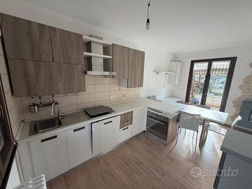 Villetta a schiera con giardino e tecnologie green