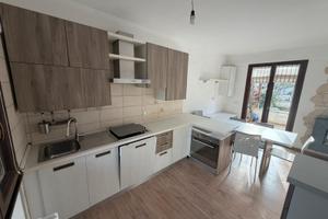 Villetta a schiera con giardino e tecnologie green