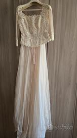 abito da sposa tonalità del rosa con strascico 