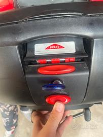 Bauletto portaoggetti per moto