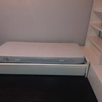 letto doppio con libreria