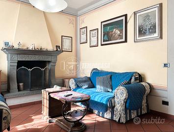 PORZIONE DI BIFAMILIARE CON GIARDINO