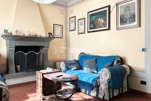 PORZIONE DI BIFAMILIARE CON GIARDINO