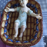 Bambinelli con cestino