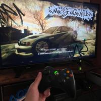 Xbox 360 S - Slim nera con joypad