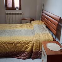 letto matrimoniale con comodini
