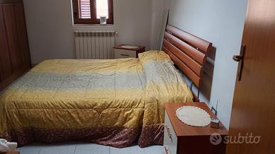 letto matrimoniale con comodini