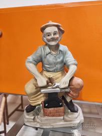 statuina fabbro in ceramica artigianale 