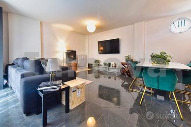 Attico con terrazzo e box
