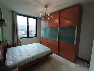 armadio a tre ante scorrevoli con vetro