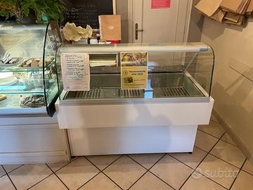 vetrina da Negozio ELLAHOT riscaldante