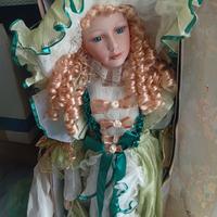 Bambola di porcellana a ombrello