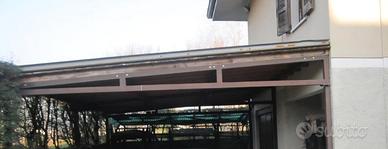 Tettoia in ferro con pannelli