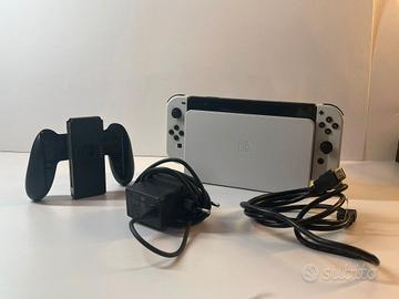 Nintendo Switch OLED 64GB   + giochi + acces