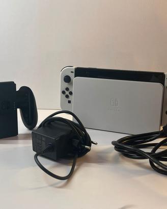 Nintendo Switch OLED 64GB   + giochi + acces