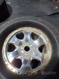 Cerchi/gomme singoli traxxas x-maxx e caricabatt.