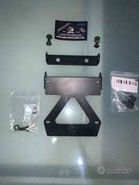 Porta targa pieghevole booster