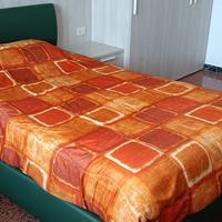 Letto a una piazza e mezzo con materasso
