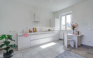 ELEGANTE TRILOCALE RISTRUTTURATO CON GIARDINO E BO