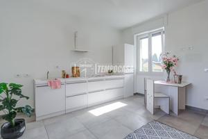ELEGANTE TRILOCALE RISTRUTTURATO CON GIARDINO E BO