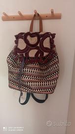 Zainetto Carpisa con decori e pochette abbinata