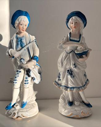 Coppia statuine vintage in porcellana bianca e blu