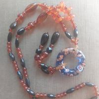 collana con ciondolo in vetro di Murano