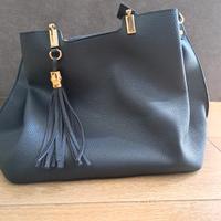 Borsa effetto pelle martellato